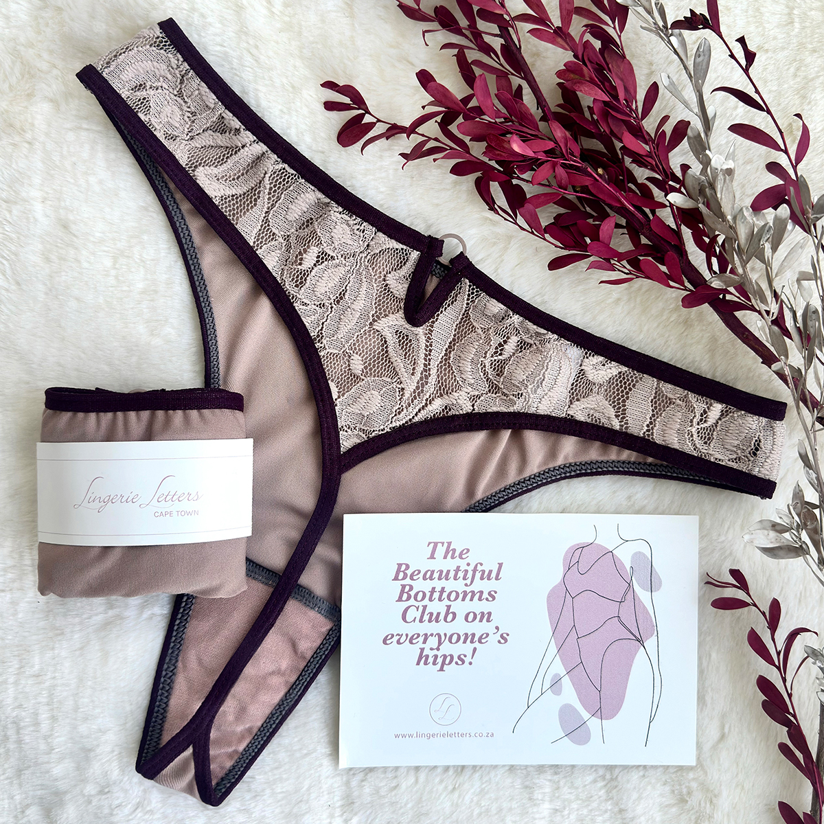 Back of Blush Berry Thong showing lace detailing and keyhole back